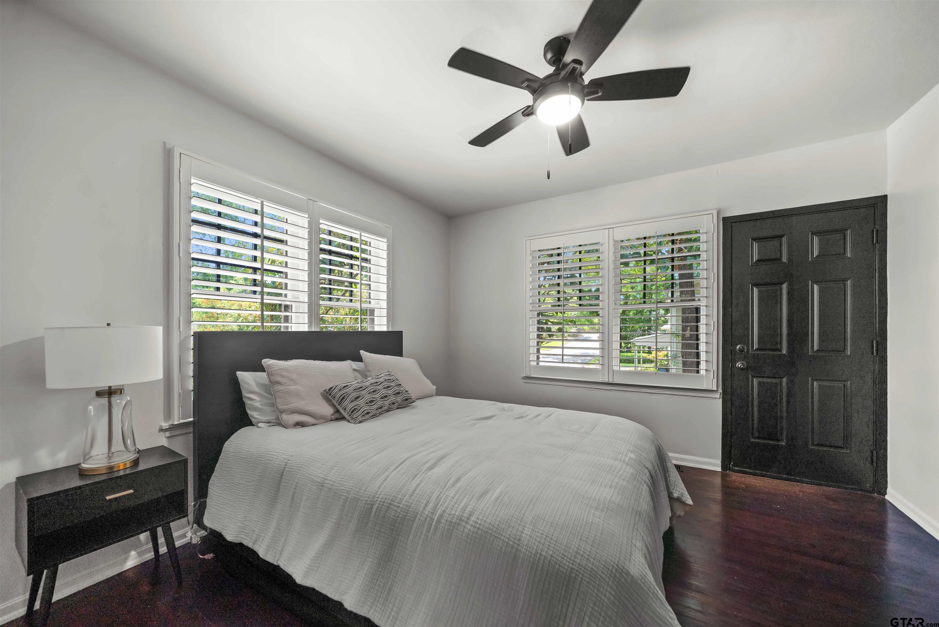 400 Lindsey Lane Tyler, TX 75701 - Photo 14 of 25 a bedroom with a bed and a window