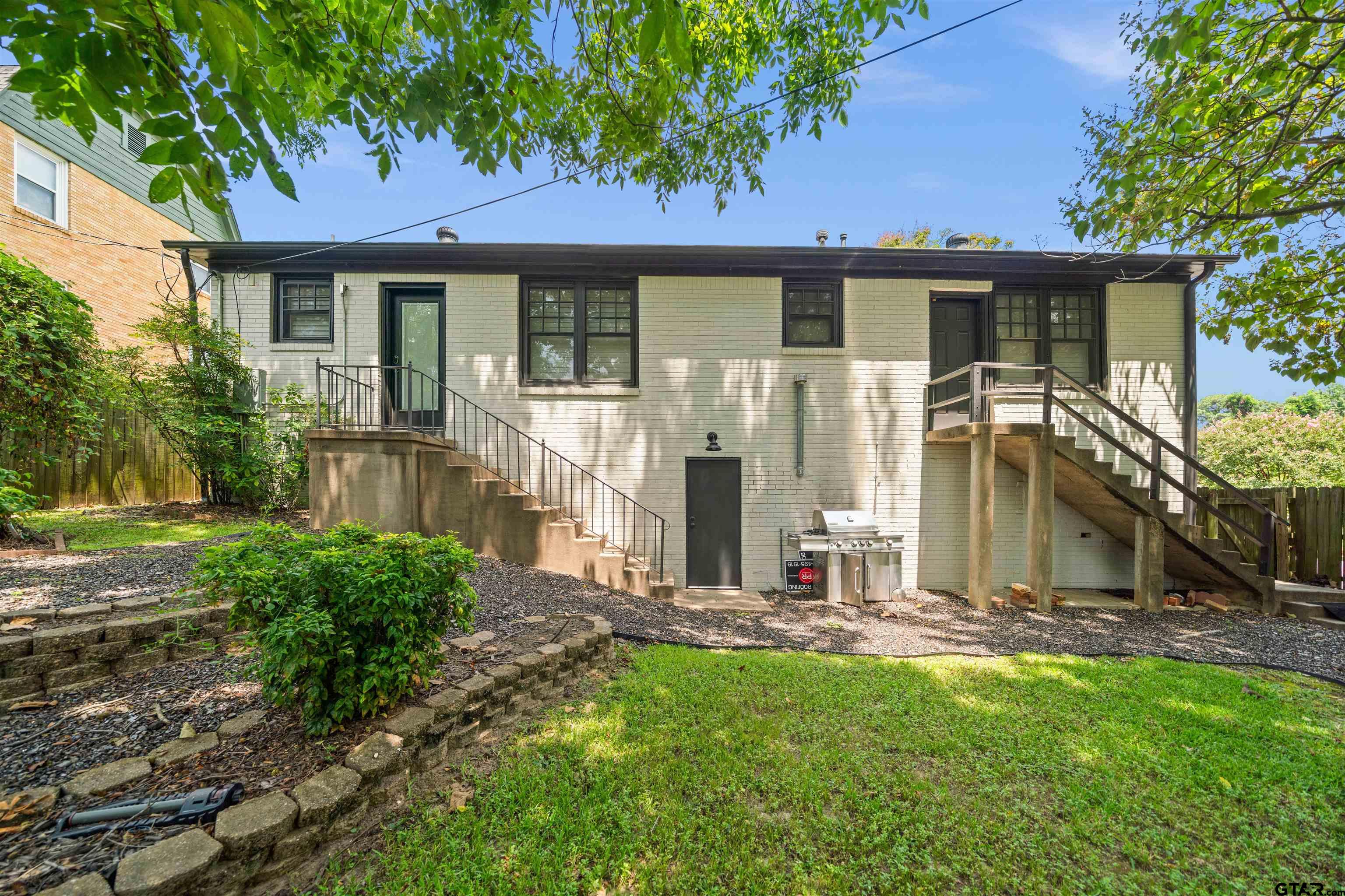 400 Lindsey Lane Tyler, TX 75701 - Photo 24 of 25 a view of a house with backyard