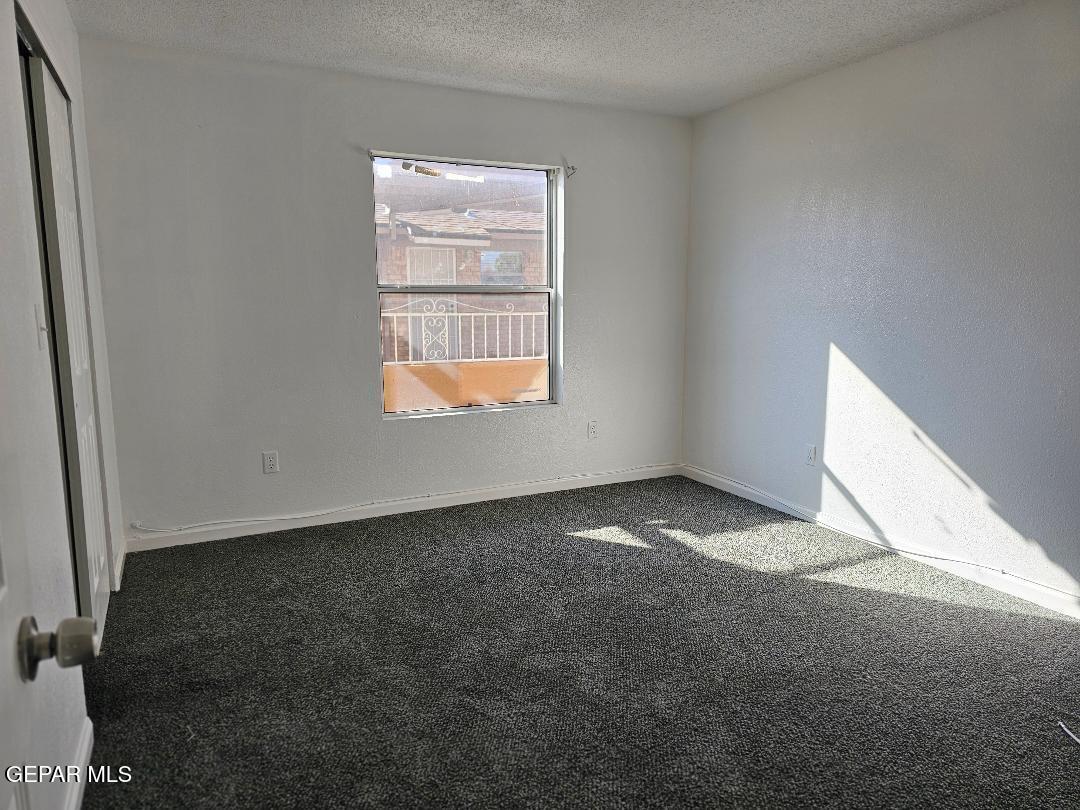 401 South 5th Street Anthony, TX 79821 - Photo 17 of 26 an empty room with a window