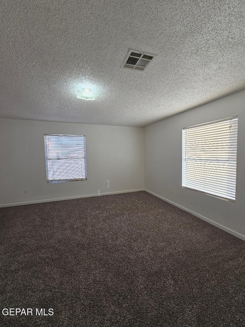 401 South 5th Street Anthony, TX 79821 - Photo 19 of 26 a view of an empty room and a window