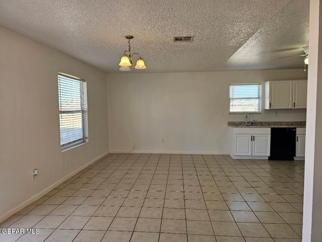 401 South 5th Street Anthony, TX 79821 - Photo 7 of 26 a view of an empty room with a window