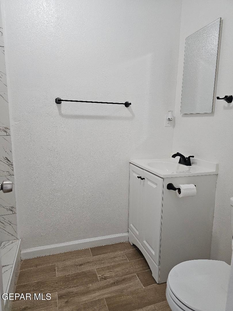 401 South 5th Street Anthony, TX 79821 - Photo 9 of 26 a bathroom with a shower