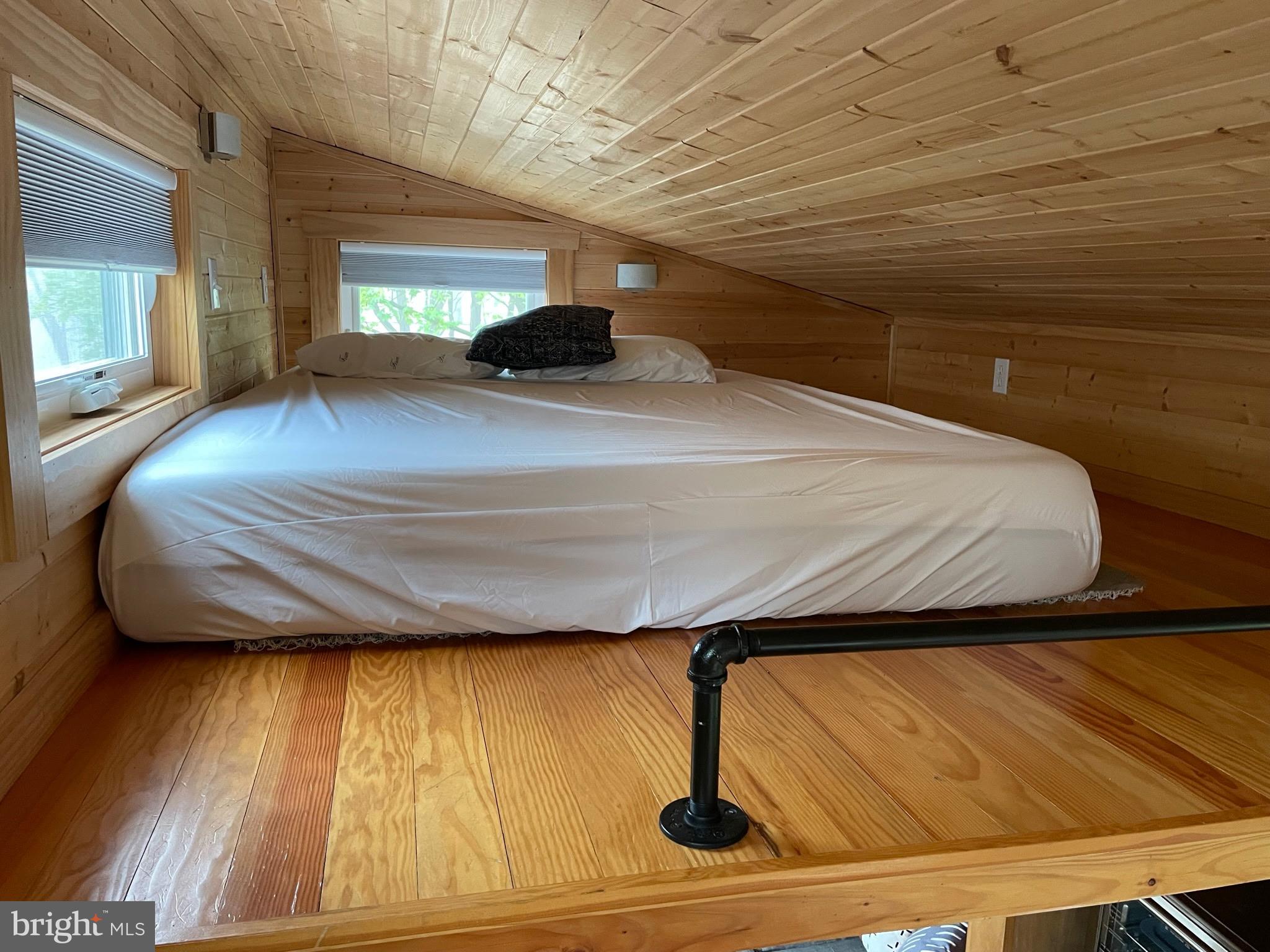 867 Schwanger Road Elizabethtown, PA 17022 - Photo 8 of 18 a bedroom with a bed and wooden floor