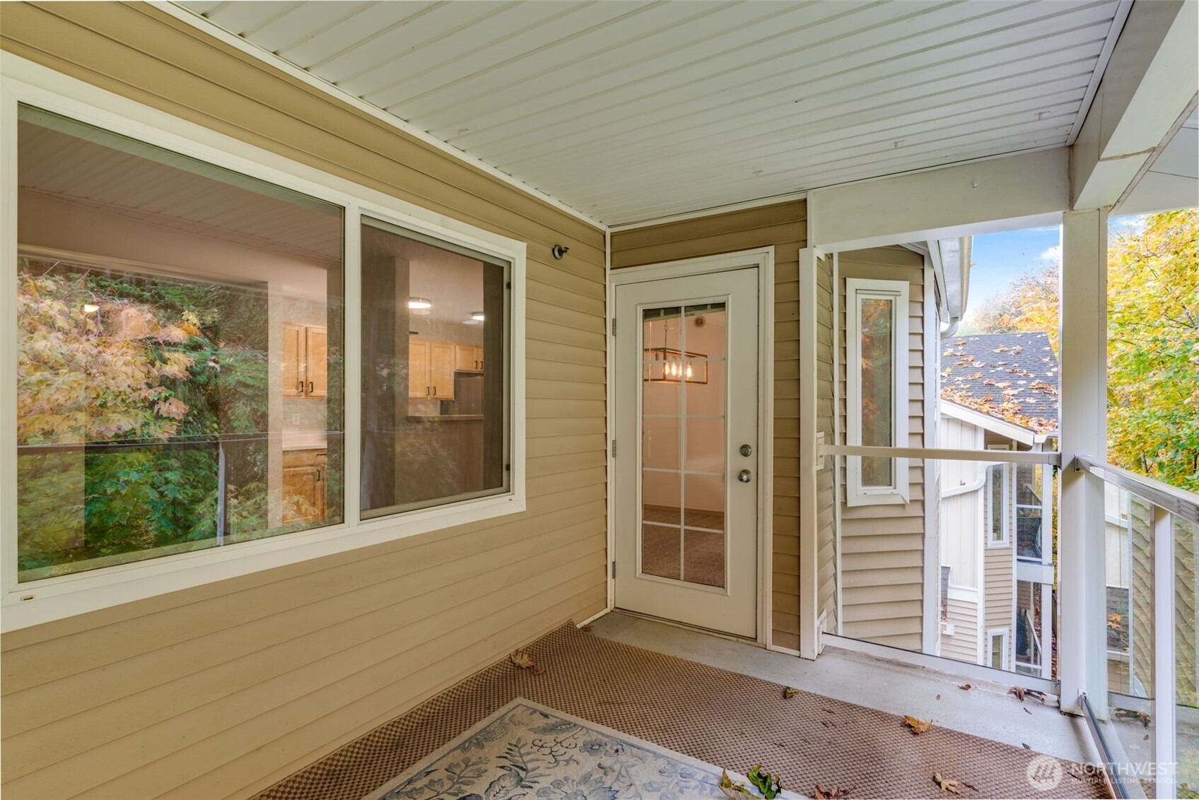 805 Harrington Place Southeast, Unit 3143 Renton, WA 98058 - Photo 12 of 25 a view of a balcony with wooden floor