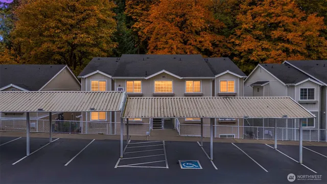 an outdoor view of house with garage