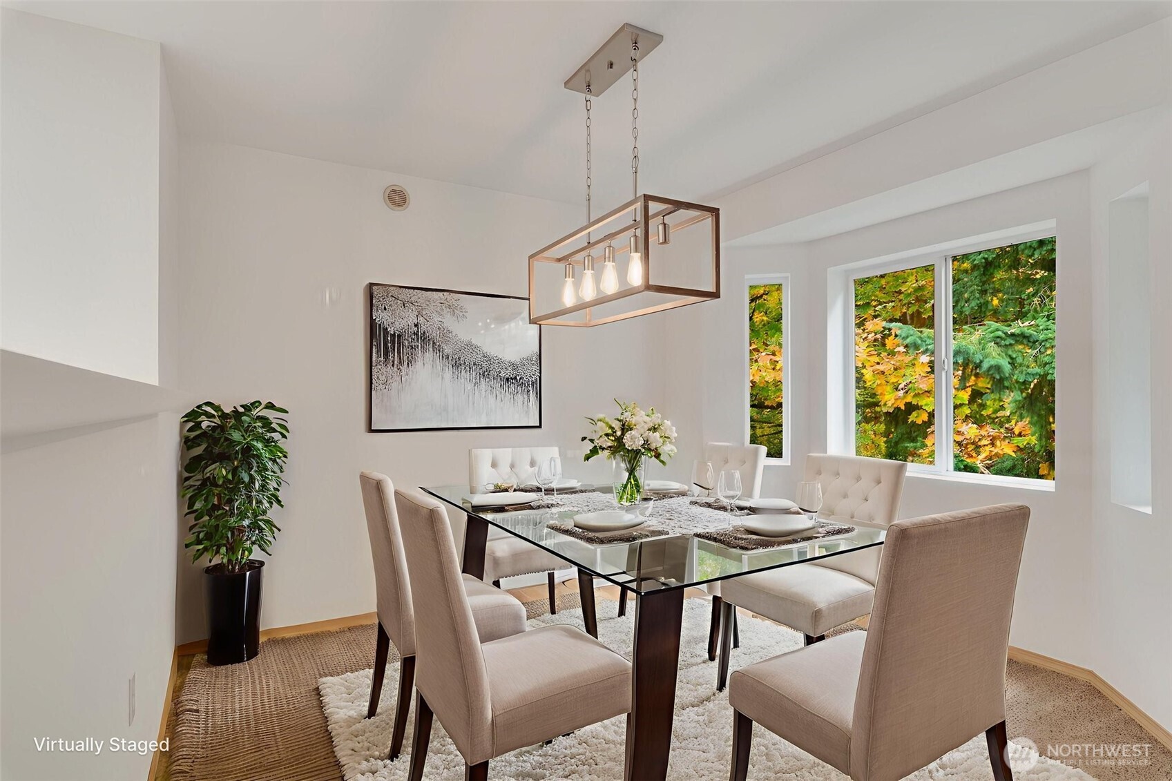 805 Harrington Place Southeast, Unit 3143 Renton, WA 98058 - Photo 5 of 25 a view of a dining room with furniture window and outside view
