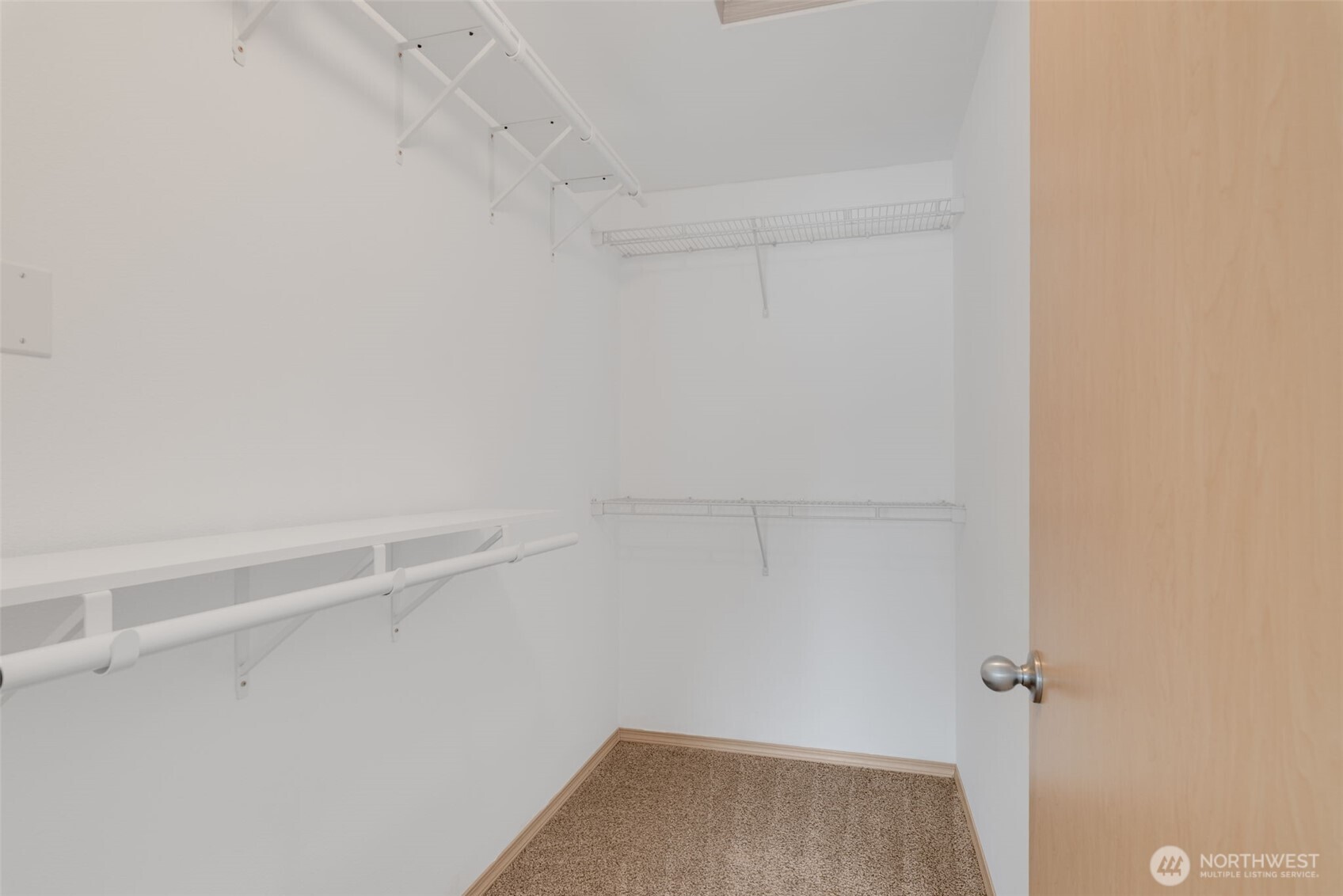 805 Harrington Place Southeast, Unit 3143 Renton, WA 98058 - Photo 7 of 25 a view of small space with racks on the wall