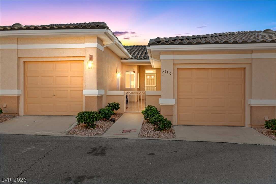 3350 Pheasant Canyon Way, Unit 1008 Laughlin, NV 89029 - Photo 1 of 80 View of front of home with stucco siding and a tile roof