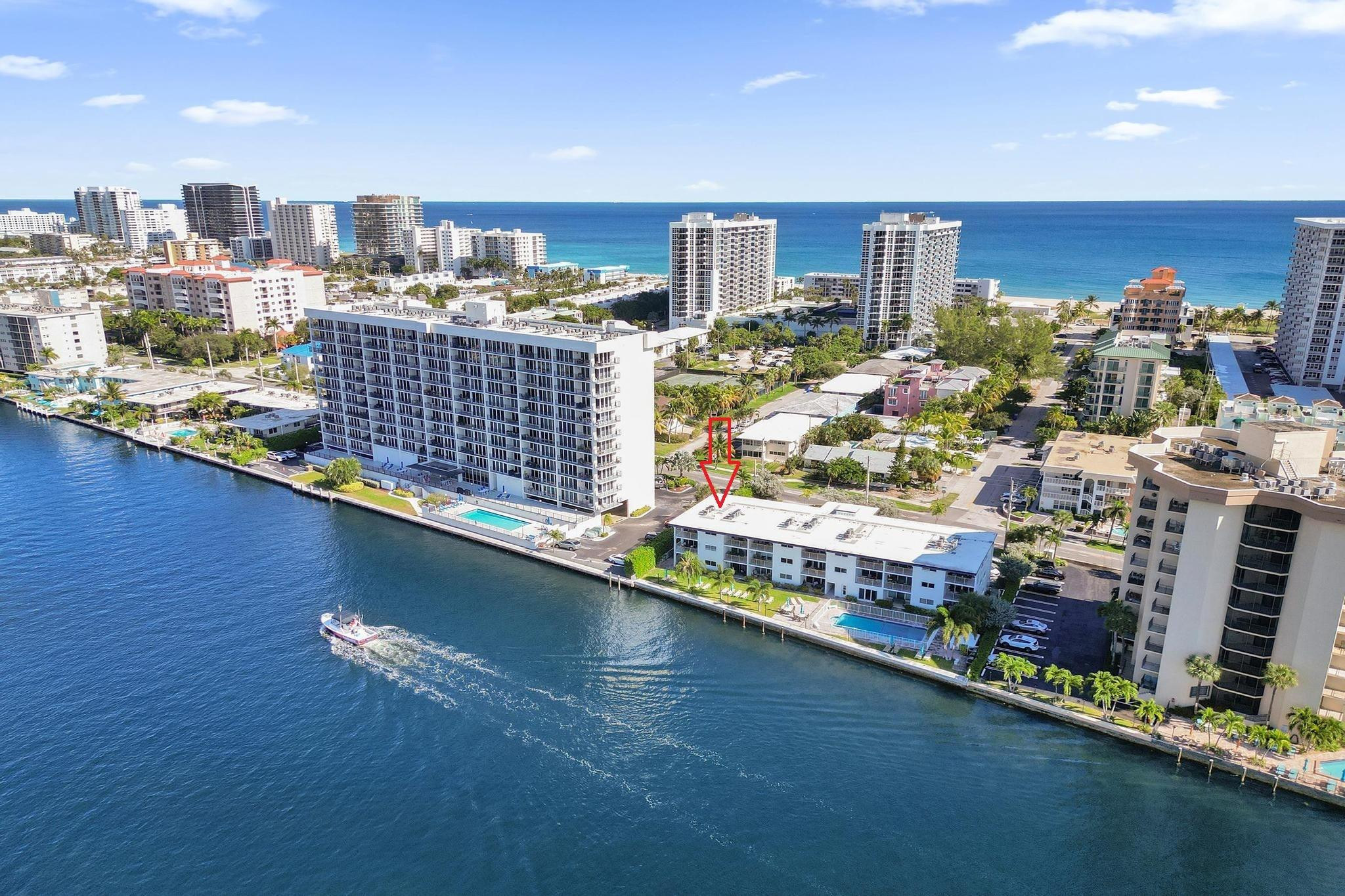 505 North Riverside Drive, Unit 7 Pompano Beach, FL 33062 - Photo 3 of 43 a city view from a balcony