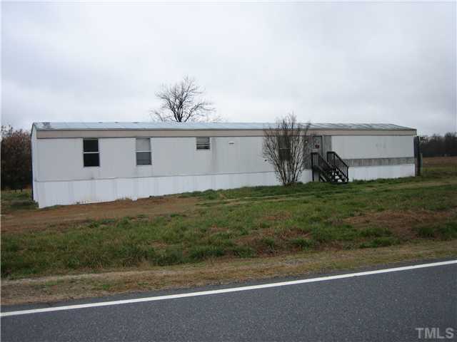Live Oak Road, Unit 1385 Coats, NC 27521 - Photo 4 of 4 The other home that needs to be removed