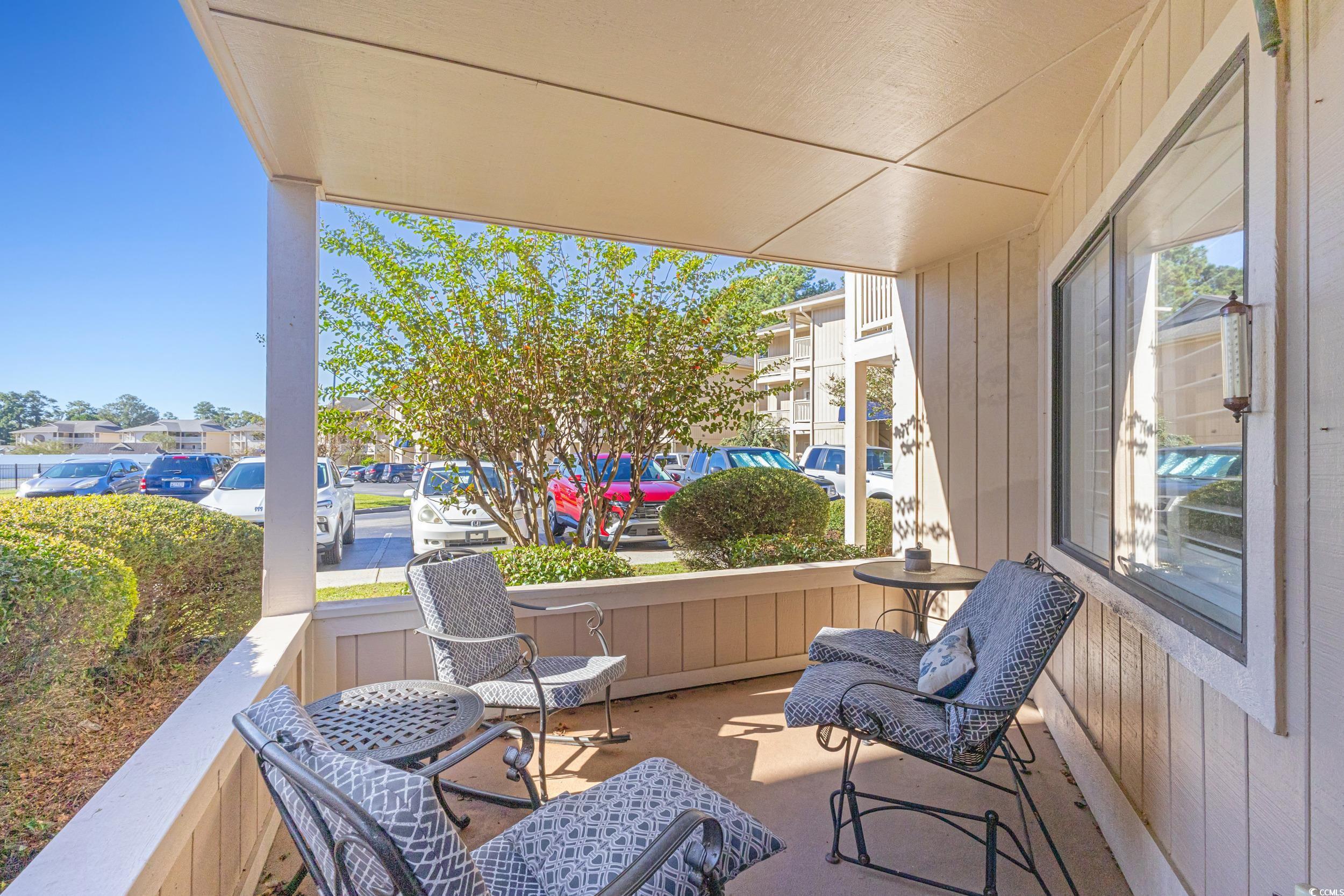 4242 Pinehurst Circle, Unit N3 Little River, SC 29566 - Photo 15 of 30 View of patio / terrace