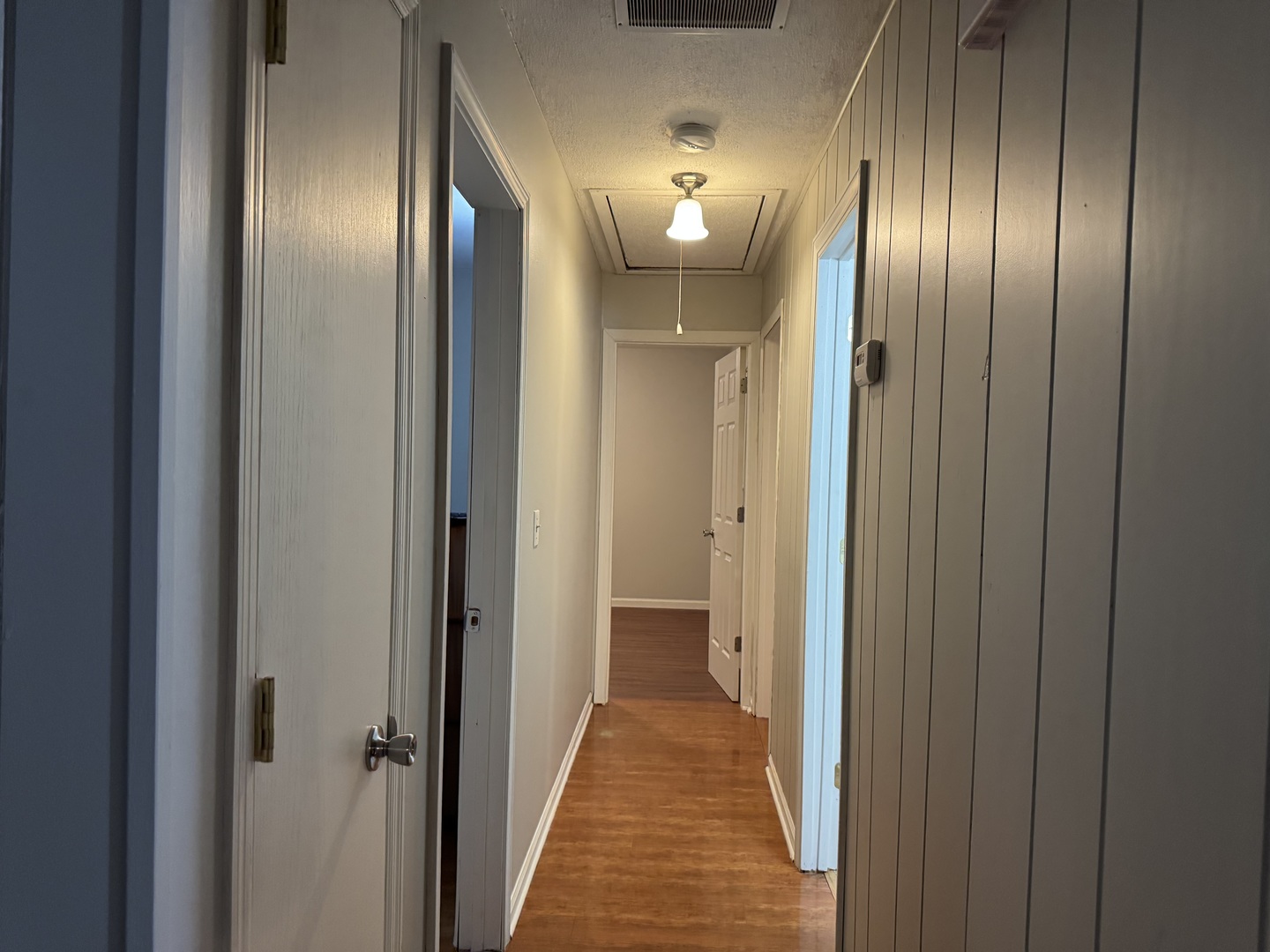 910 West Kennedy Road Braidwood, IL 60408 - Photo 11 of 23 a view of a hallway with wooden floor