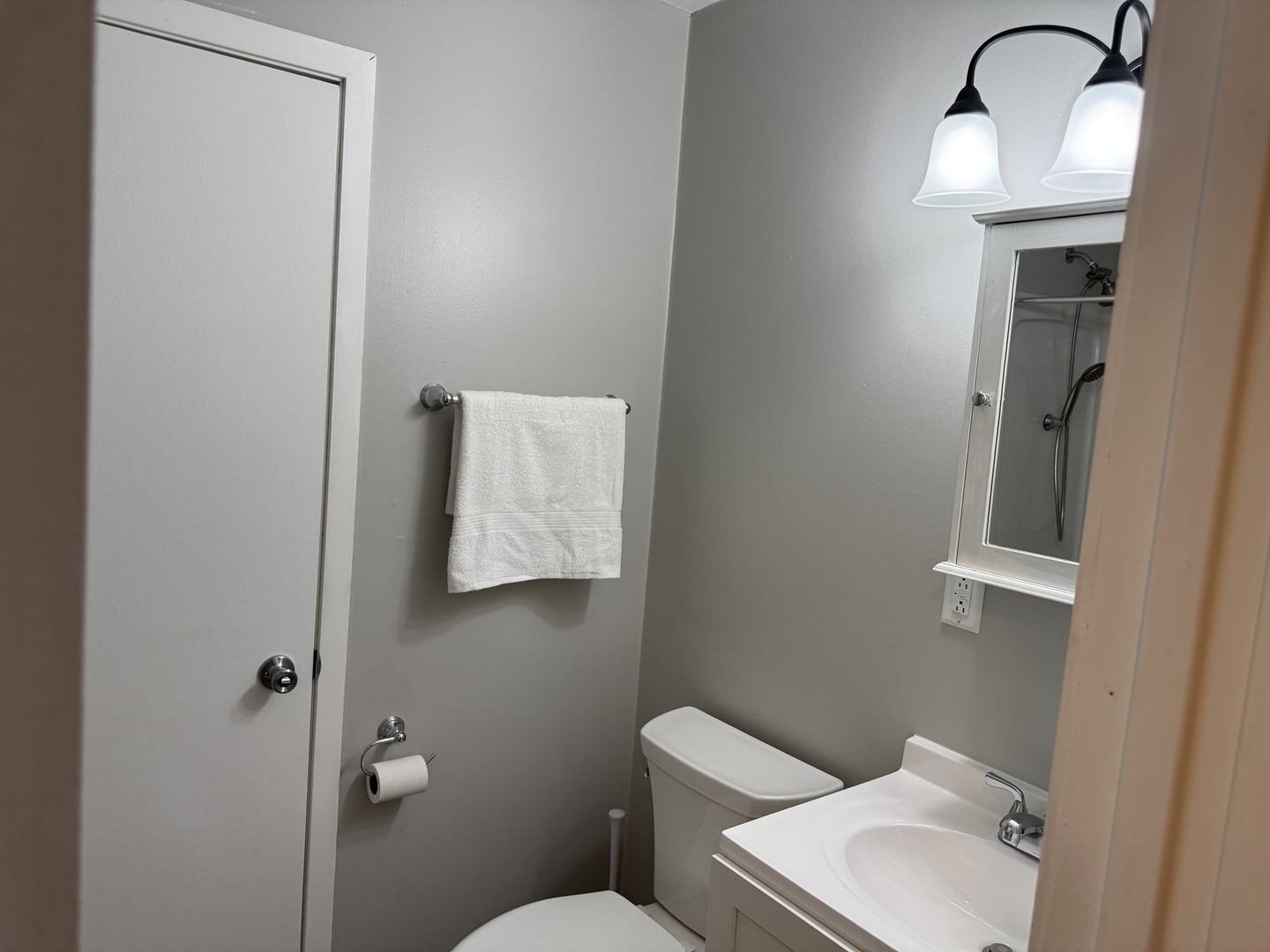 910 West Kennedy Road Braidwood, IL 60408 - Photo 17 of 23 a bathroom with a toilet sink and mirror