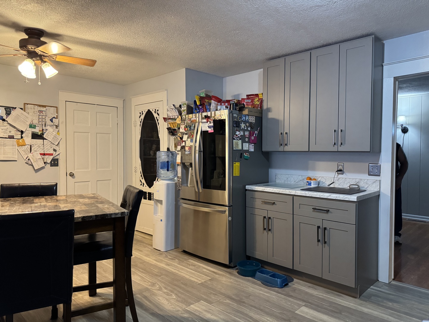 910 West Kennedy Road Braidwood, IL 60408 - Photo 8 of 23 a kitchen with stainless steel appliances granite countertop a refrigerator and a stove top oven