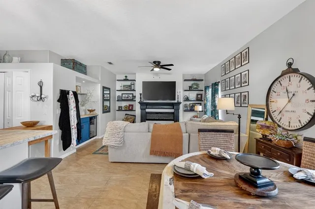 a view of a livingroom with furniture and a flat screen tv