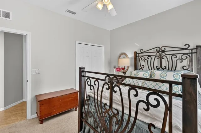 a bathroom with a toilet a sink and a mirror