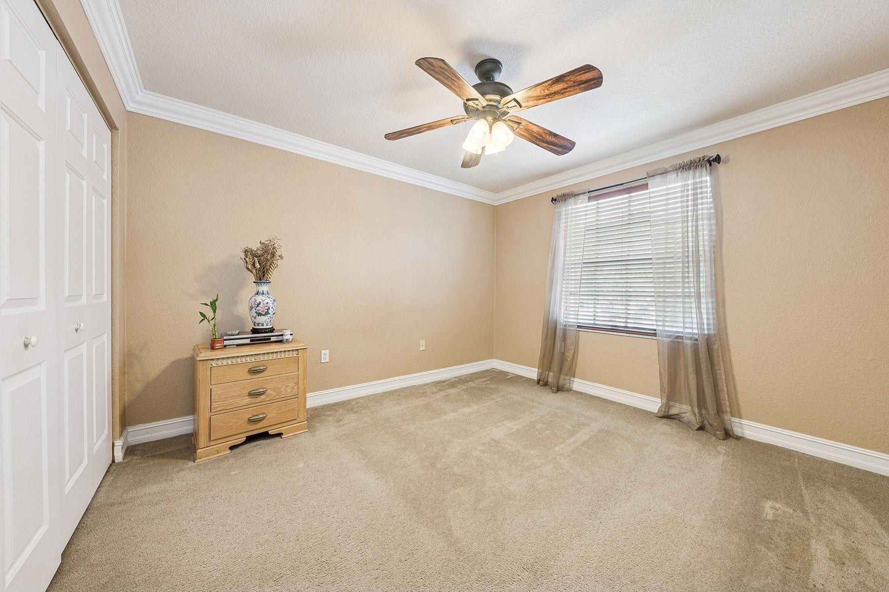 2755 Southwest 165th Avenue Miramar, FL 33027 - Photo 12 of 18 an empty room with closet and windows