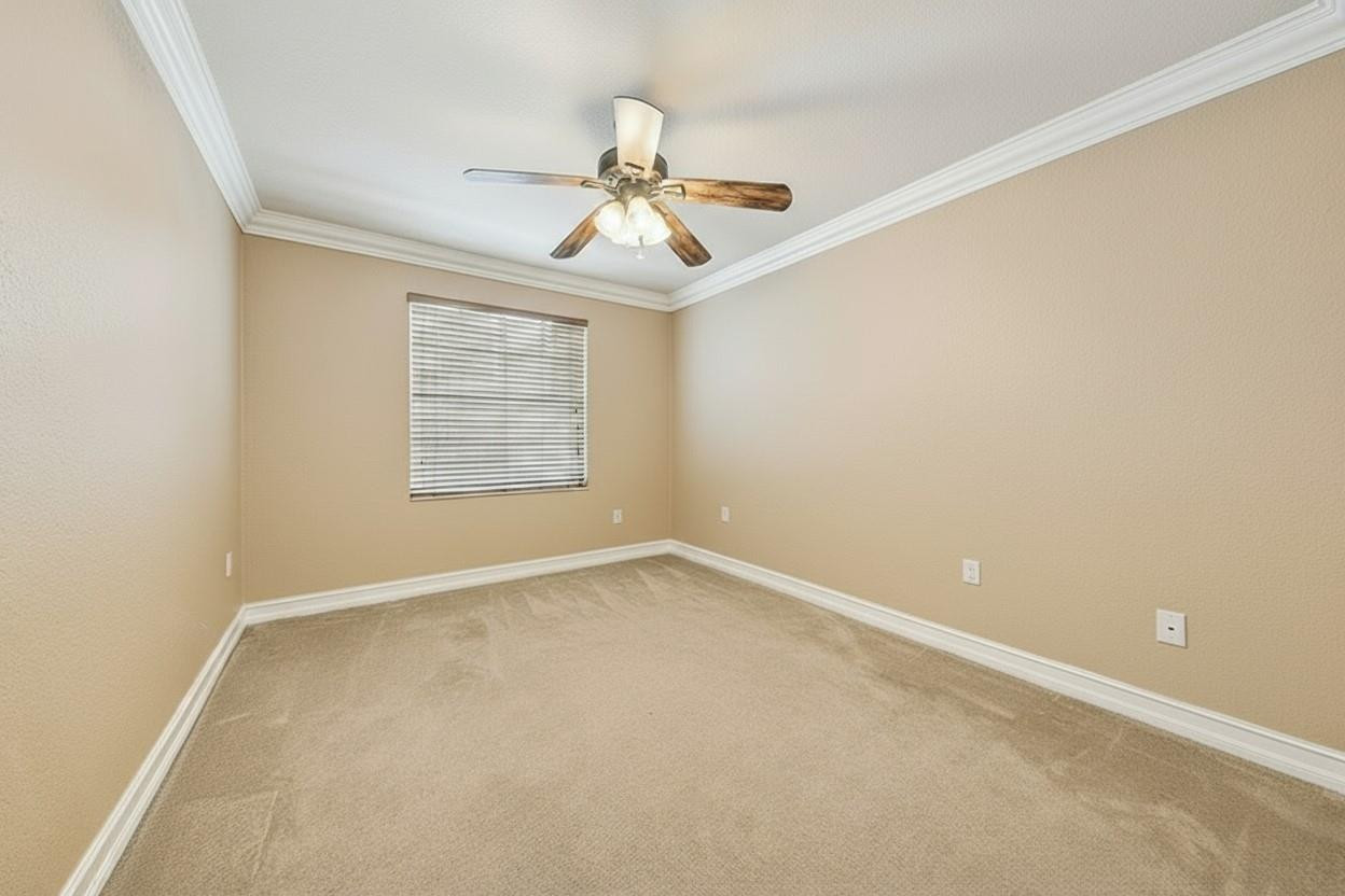 2755 Southwest 165th Avenue Miramar, FL 33027 - Photo 14 of 18 an empty room with windows and fan