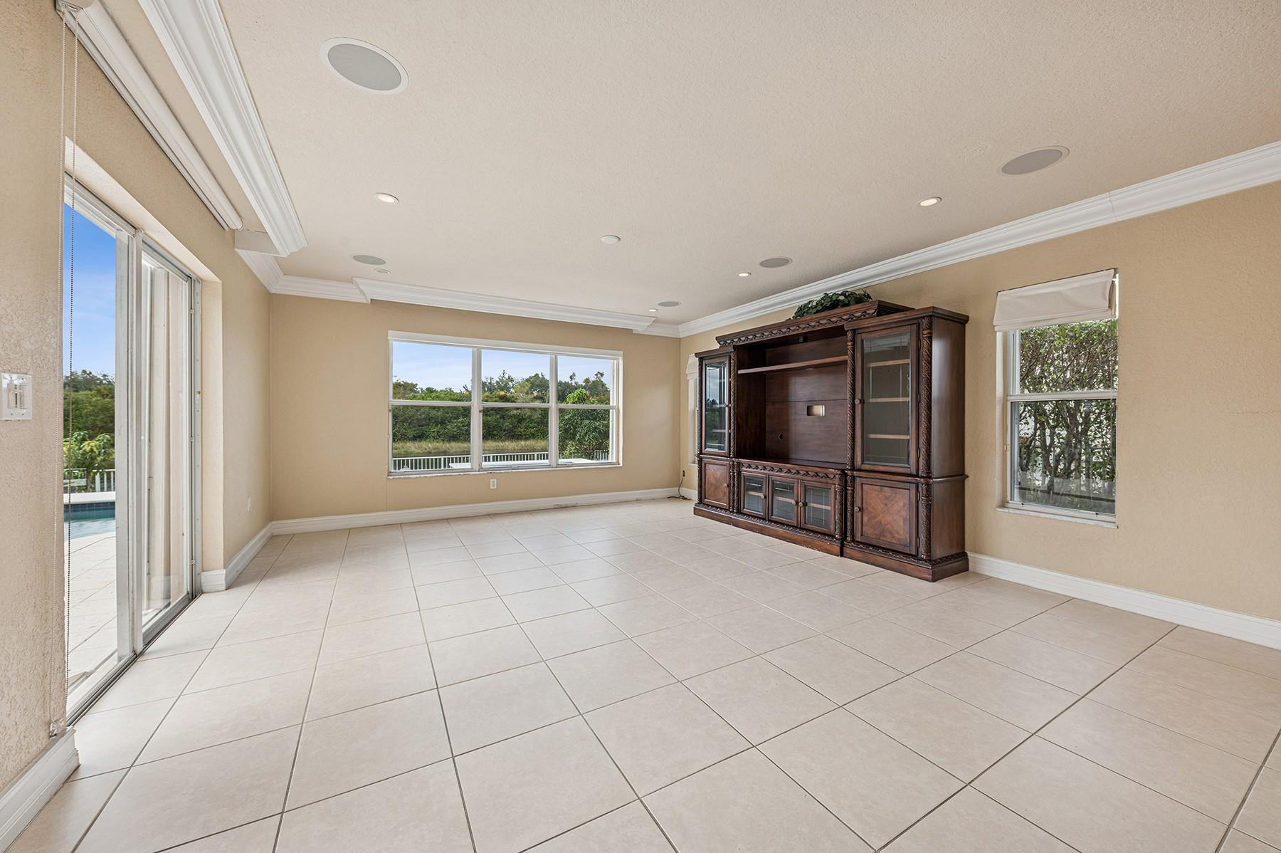 2755 Southwest 165th Avenue Miramar, FL 33027 - Photo 8 of 18 a view of an empty room with a window