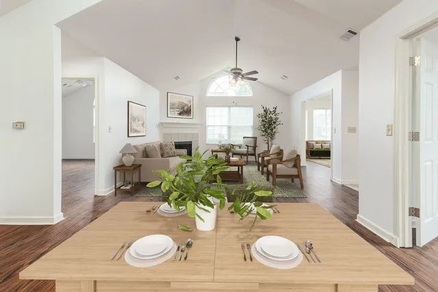 a very nice looking dining room with a table and chairs