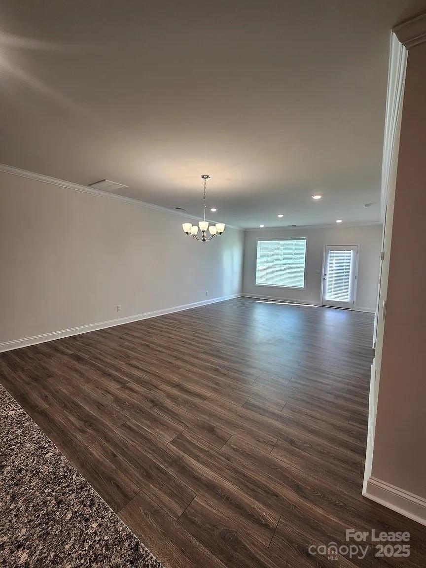 4146 Steel Way Sherrills Ford, NC 28673 - Photo 12 of 12 an empty room with wooden floor
