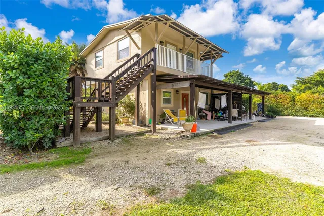 a view of a building with a park
