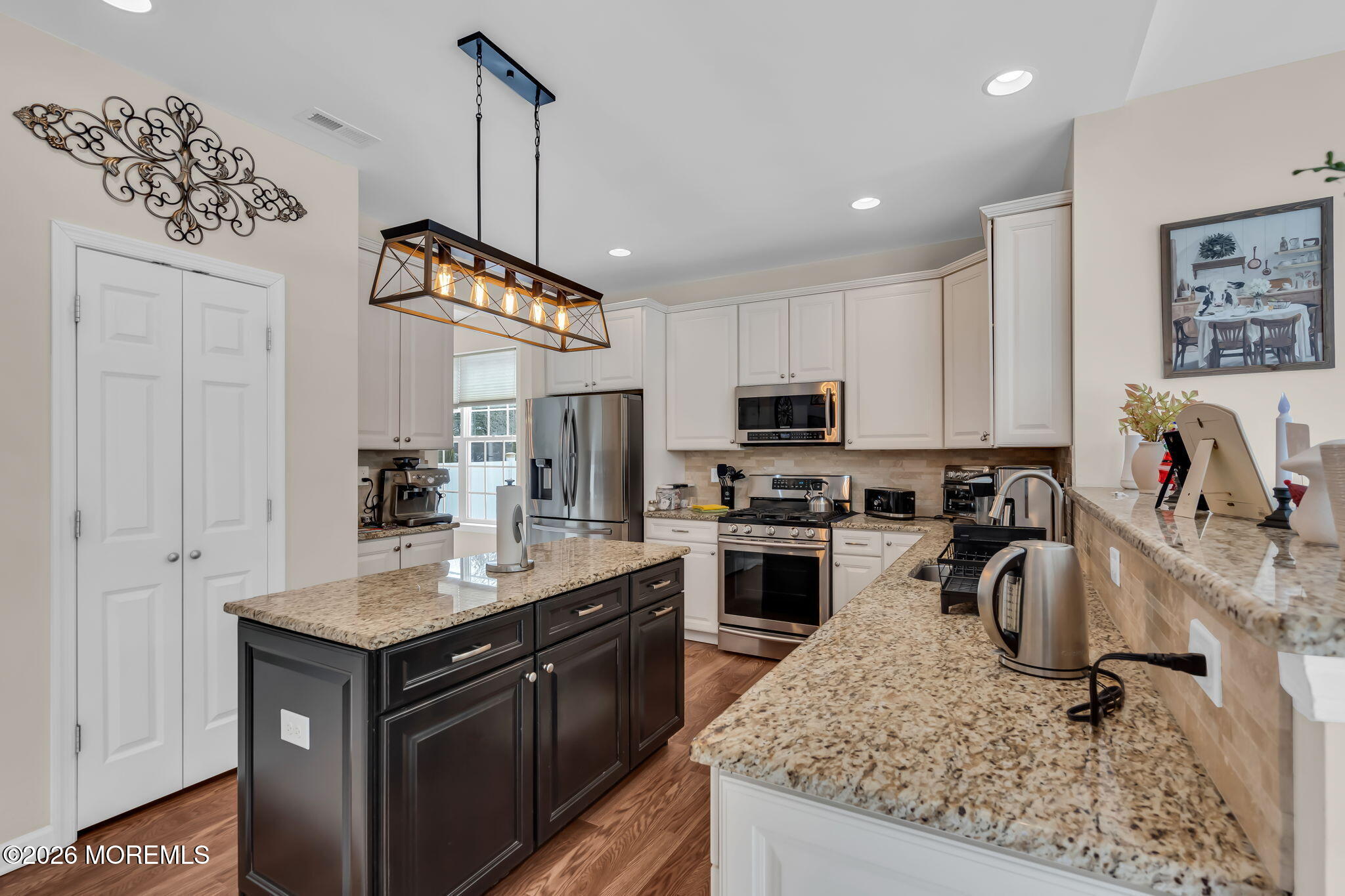 81B North Locust Avenue, Unit A Marlton, NJ 08053 - Photo 23 of 87 a kitchen with kitchen island granite countertop a sink appliances cabinets and counter space