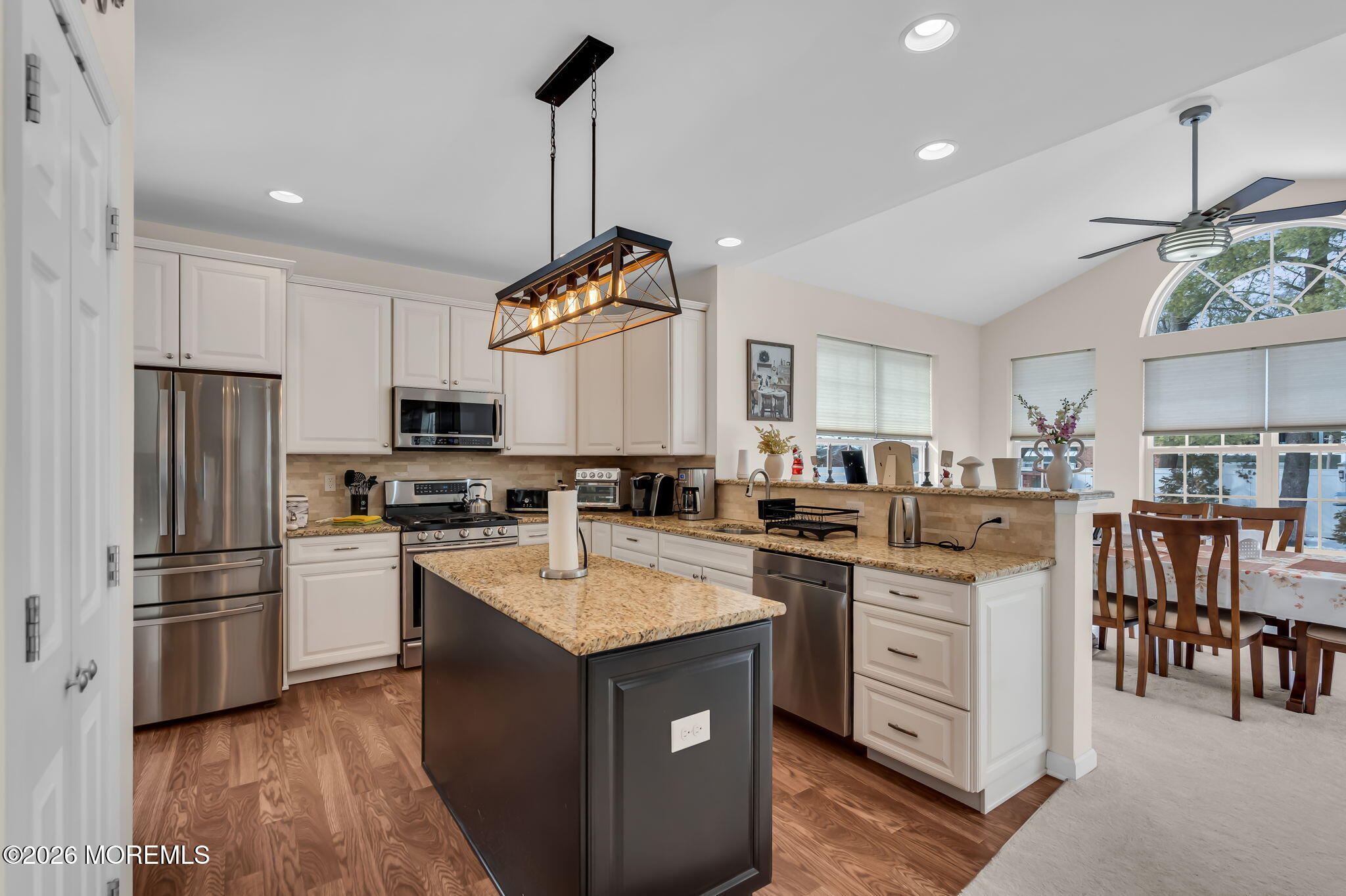 81B North Locust Avenue, Unit A Marlton, NJ 08053 - Photo 26 of 87 a kitchen with kitchen island granite countertop a sink appliances cabinets and counter space