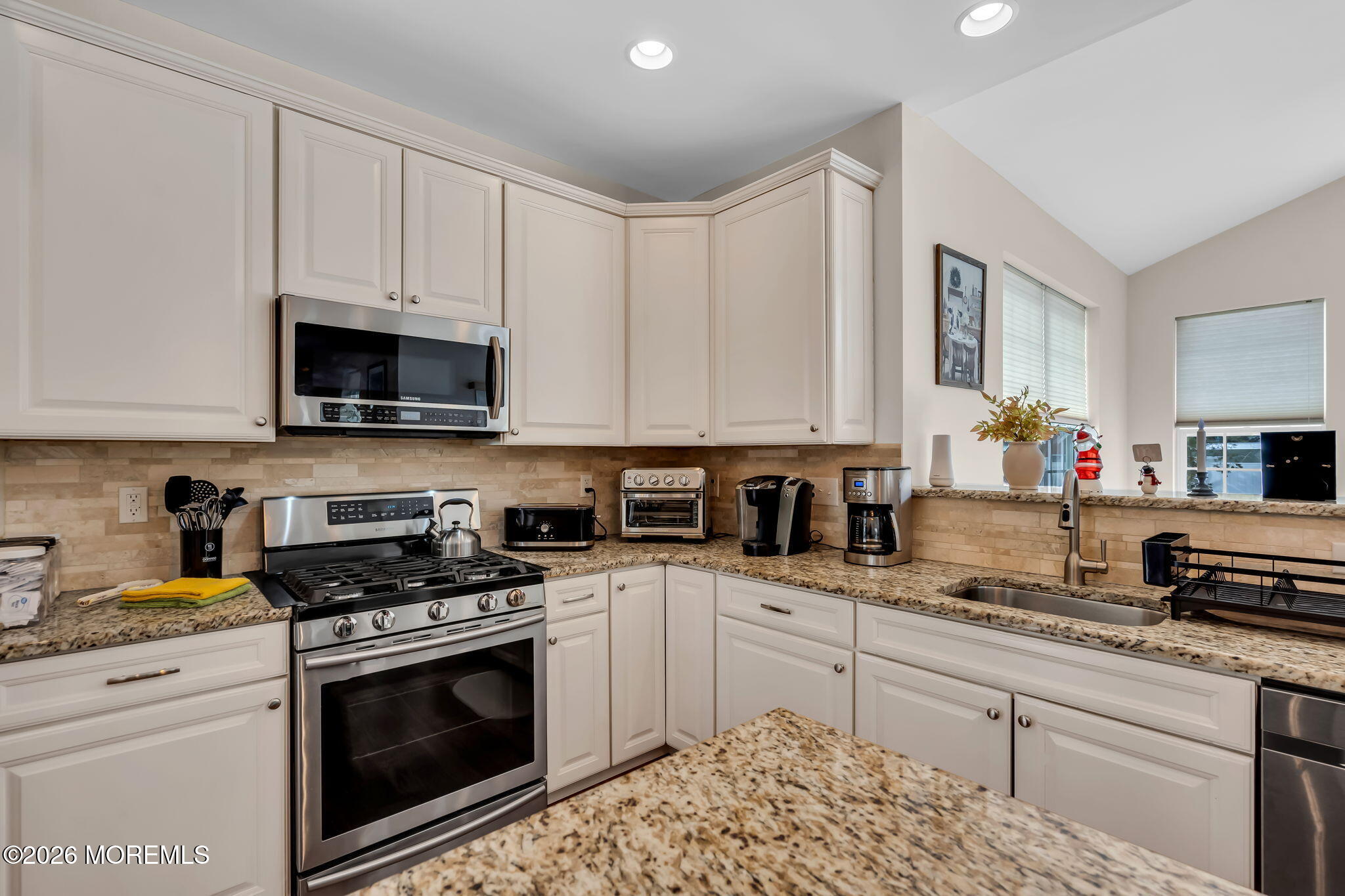 81B North Locust Avenue, Unit A Marlton, NJ 08053 - Photo 27 of 87 a kitchen with granite countertop white cabinets sink and stainless steel appliances