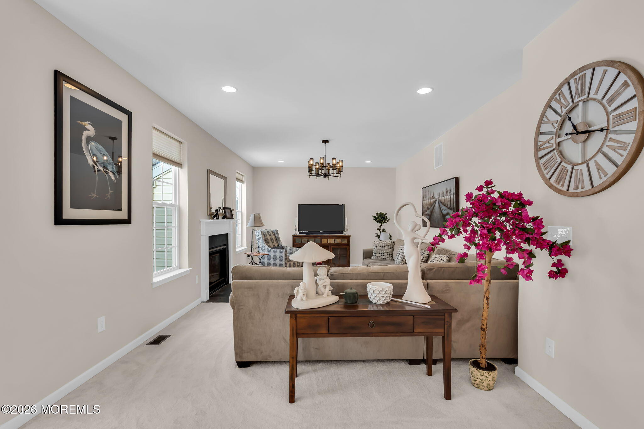 81B North Locust Avenue, Unit A Marlton, NJ 08053 - Photo 30 of 87 a living room with furniture and a chandelier
