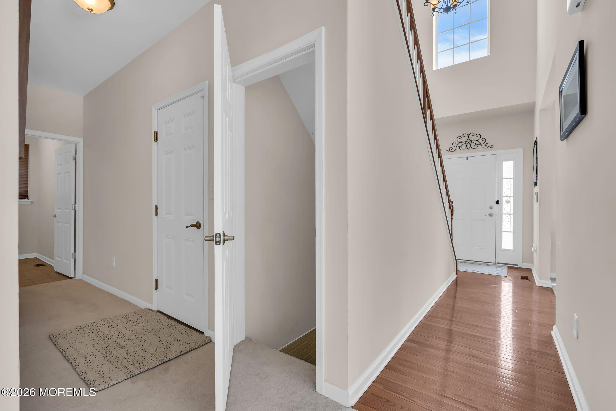 81B North Locust Avenue, Unit A Marlton, NJ 08053 - Photo 32 of 87 a view of a hallway with wooden floor and staircase