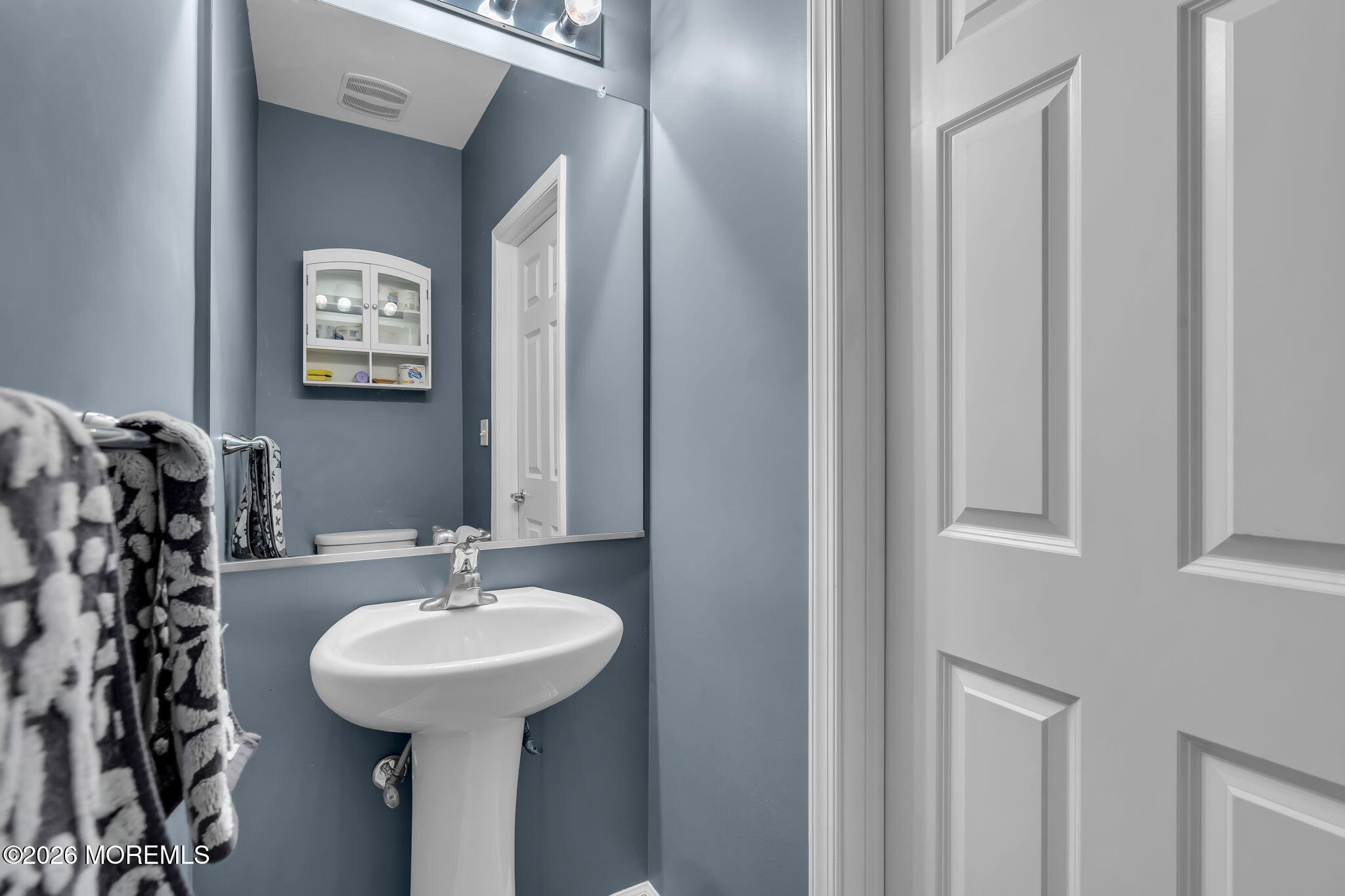 81B North Locust Avenue, Unit A Marlton, NJ 08053 - Photo 35 of 87 a bathroom with a sink and a mirror
