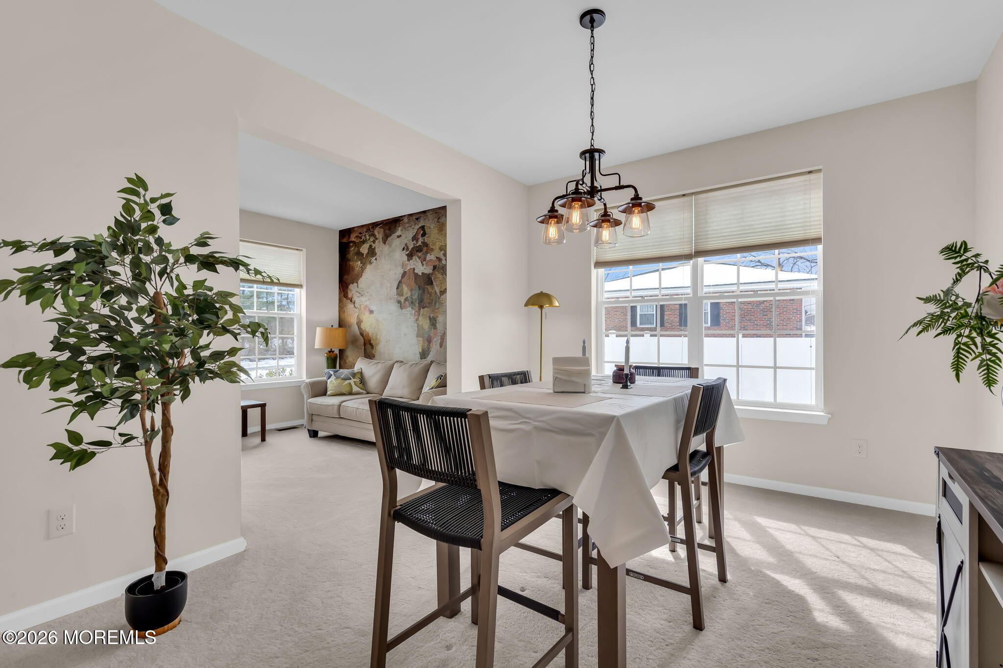 81B North Locust Avenue, Unit A Marlton, NJ 08053 - Photo 37 of 87 a view of a dining room with furniture window and wooden floor