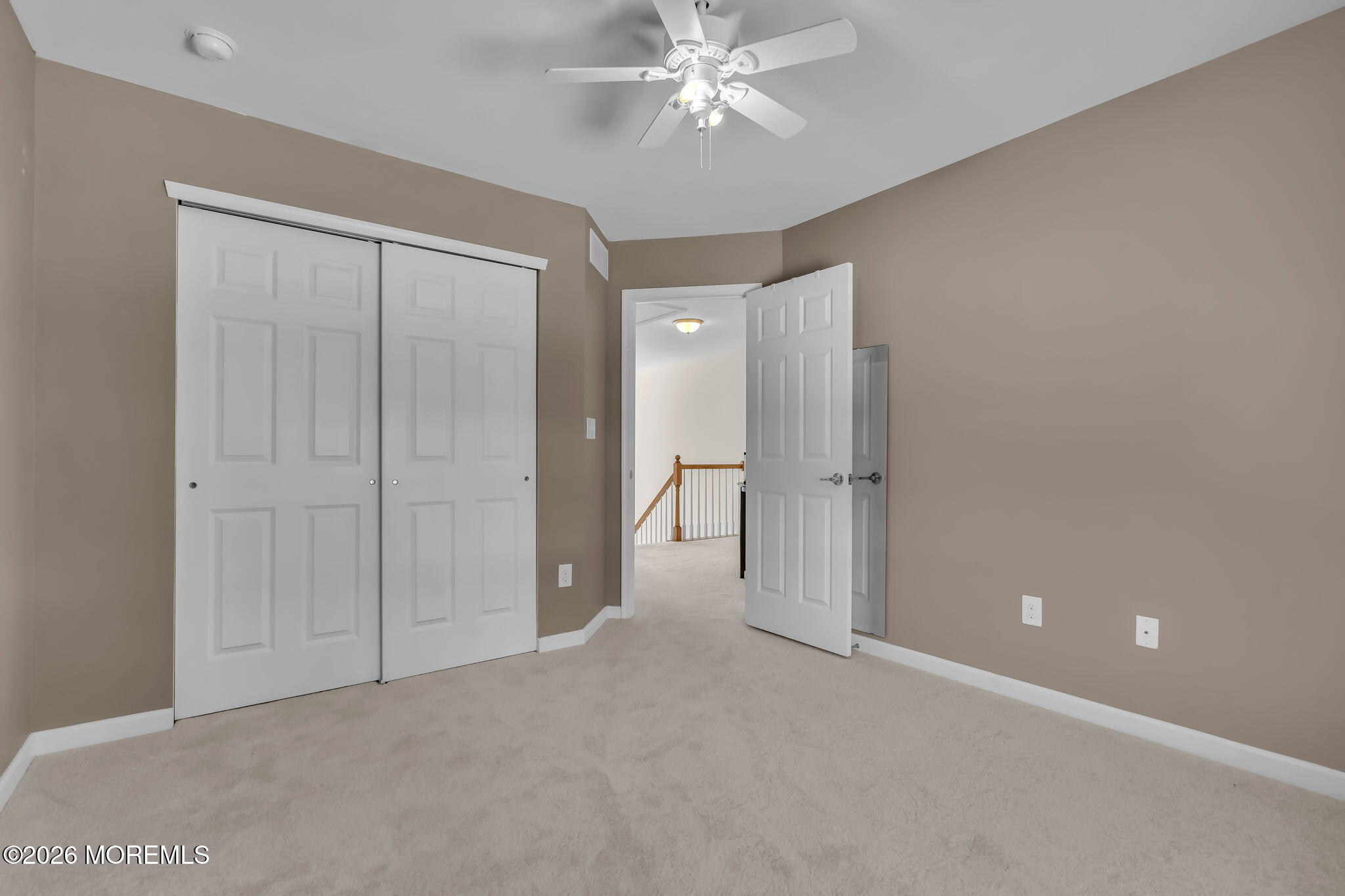 81B North Locust Avenue, Unit A Marlton, NJ 08053 - Photo 63 of 87 a view of an empty room and a chandelier fan