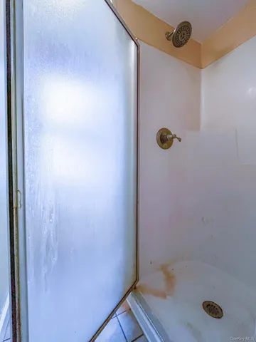 a bathroom with a toilet and a sink