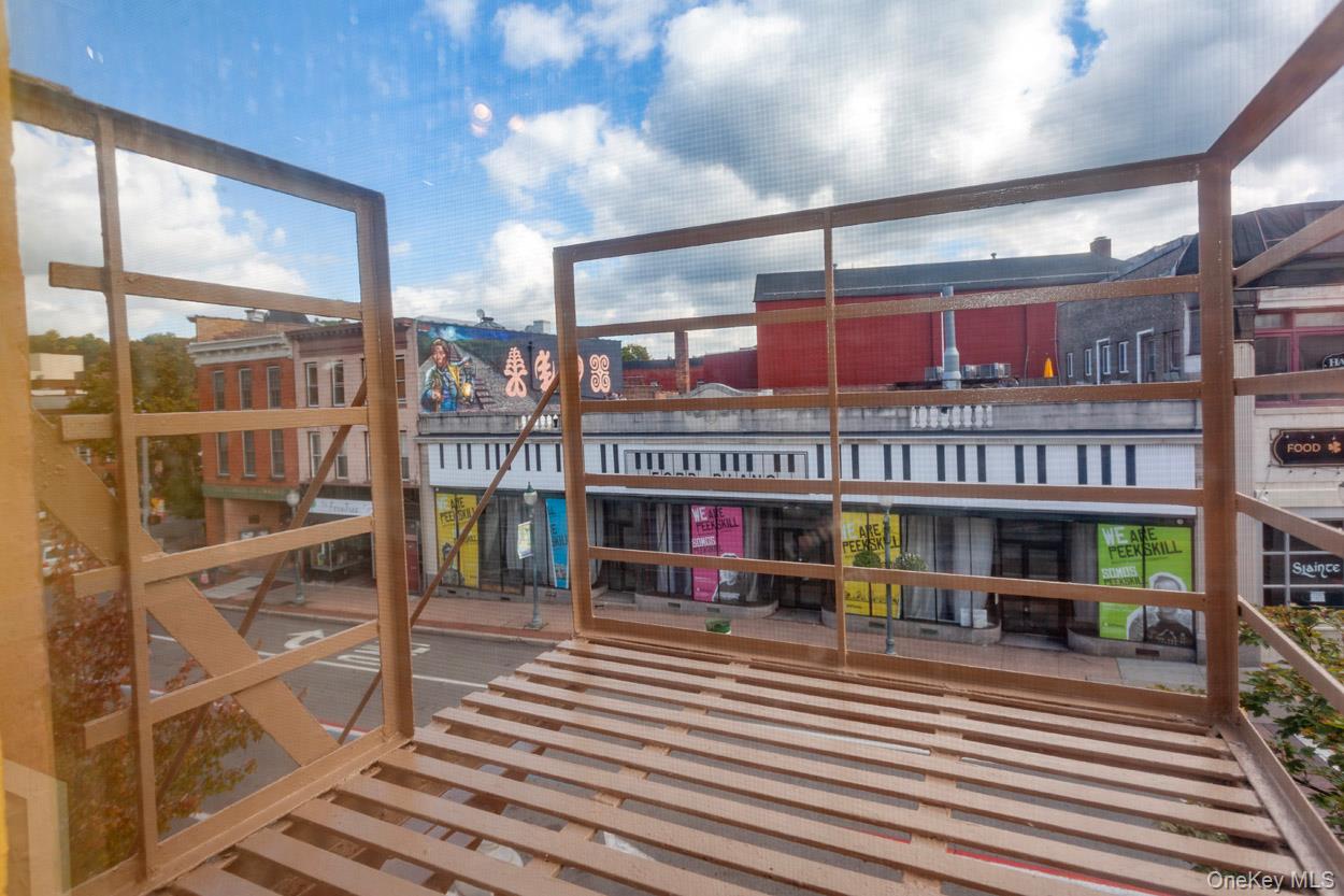 14 South Division Street, Unit 3 Peekskill, NY 10566 - Photo 15 of 17 a view of a building with sitting area