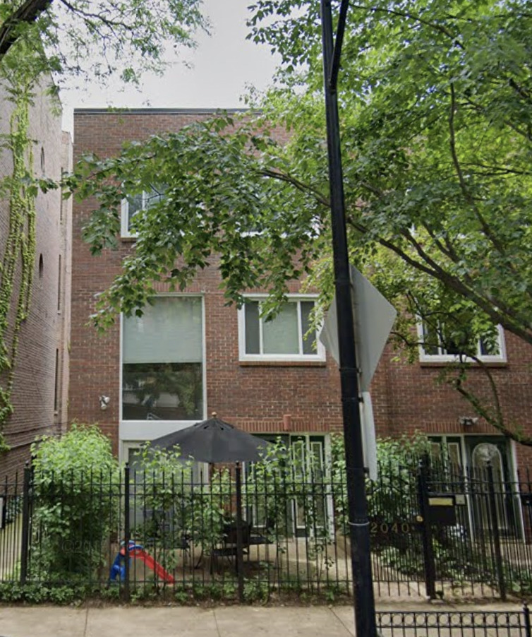 2040 North Cleveland Avenue, Unit B Chicago, IL 60614 - Photo 1 of 1 a view of a brick house with a tree in front of it