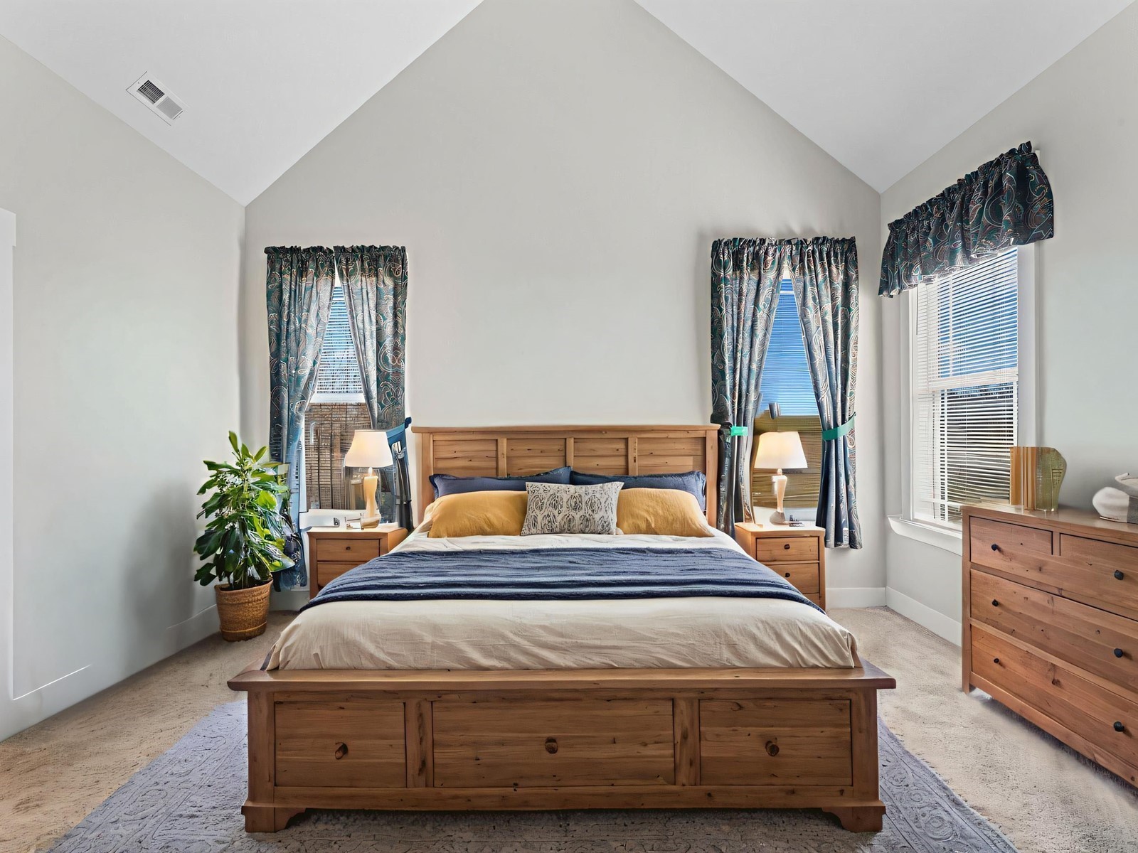 506 Bill Fuson Road McMinnville, TN 37110 - Photo 7 of 22 a bedroom with a bed and a potted plant