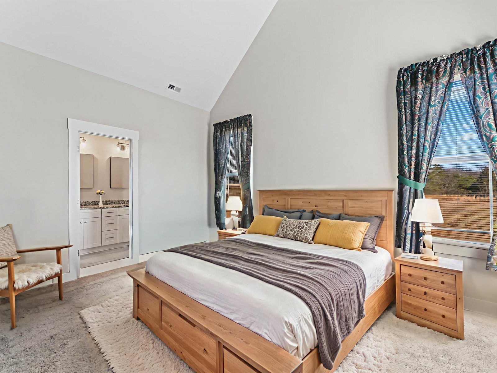 506 Bill Fuson Road McMinnville, TN 37110 - Photo 9 of 22 a bedroom with a large bed and a table