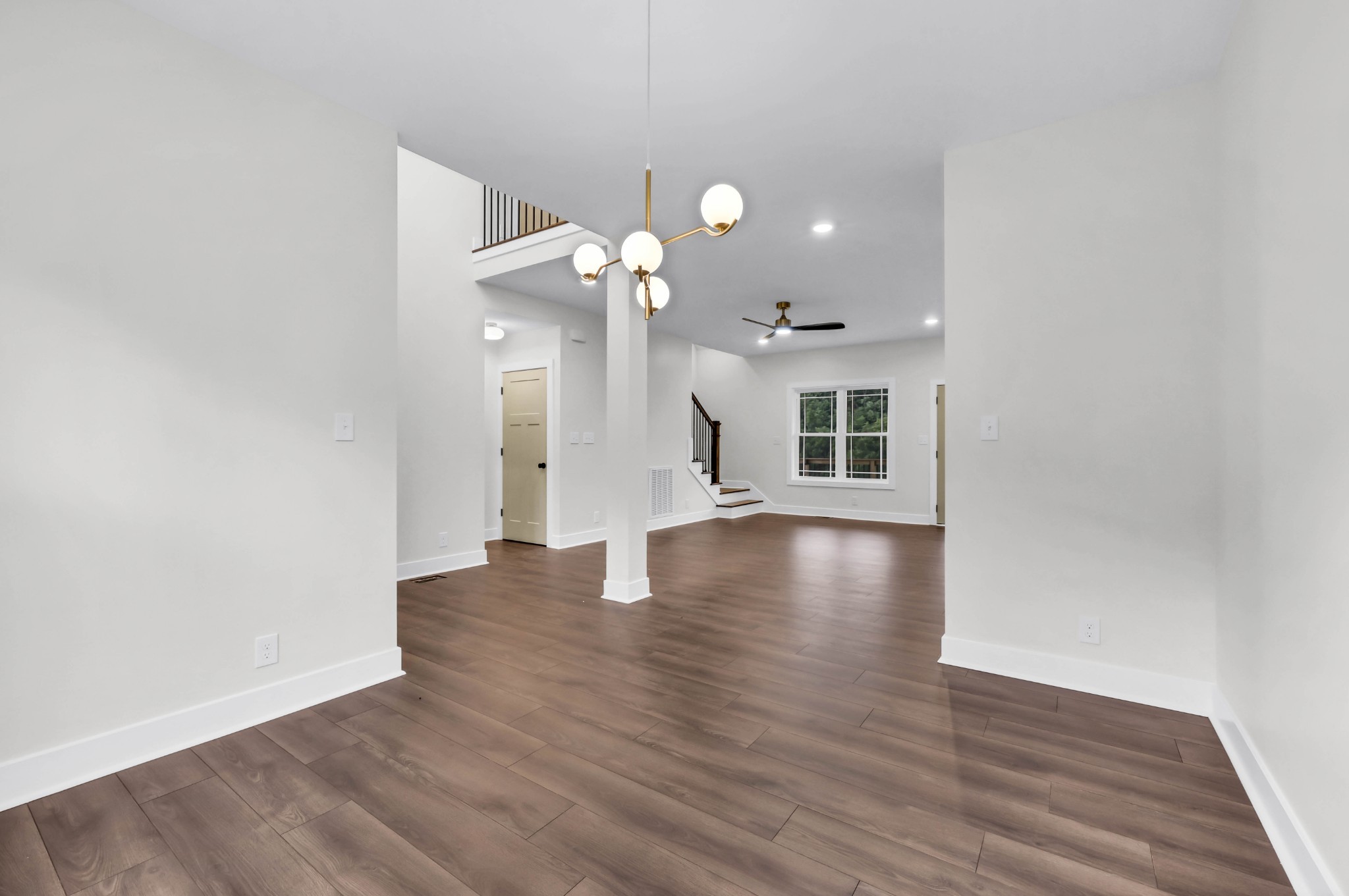 5580 Chambers Road Cumberland Furnace, TN 37051 - Photo 11 of 51 wooden floor in an empty room with a window