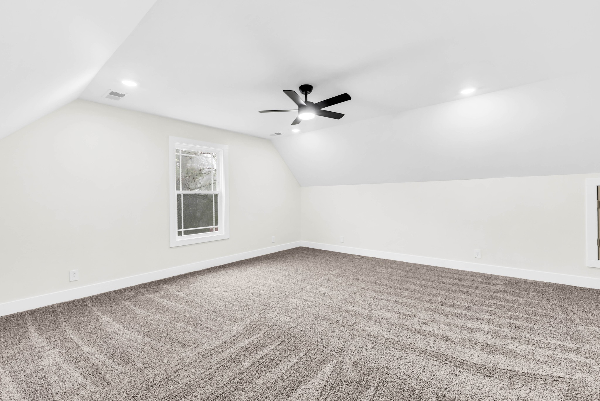 5580 Chambers Road Cumberland Furnace, TN 37051 - Photo 37 of 51 an empty room with a window and a ceiling fan