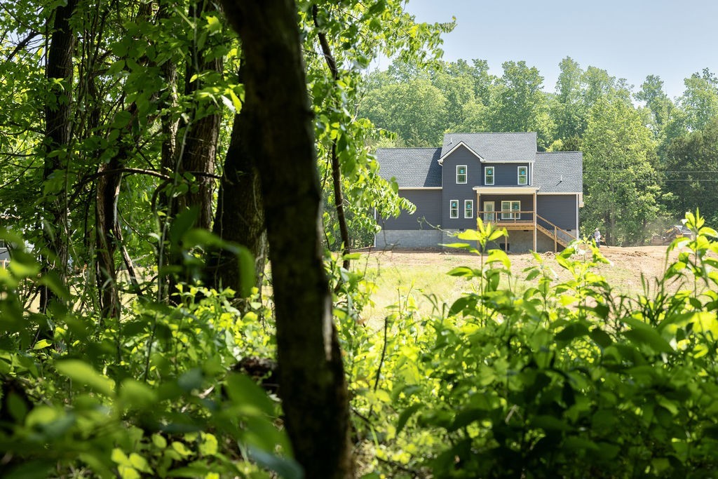 5580 Chambers Road Cumberland Furnace, TN 37051 - Photo 49 of 51 a front view of a house with a yard