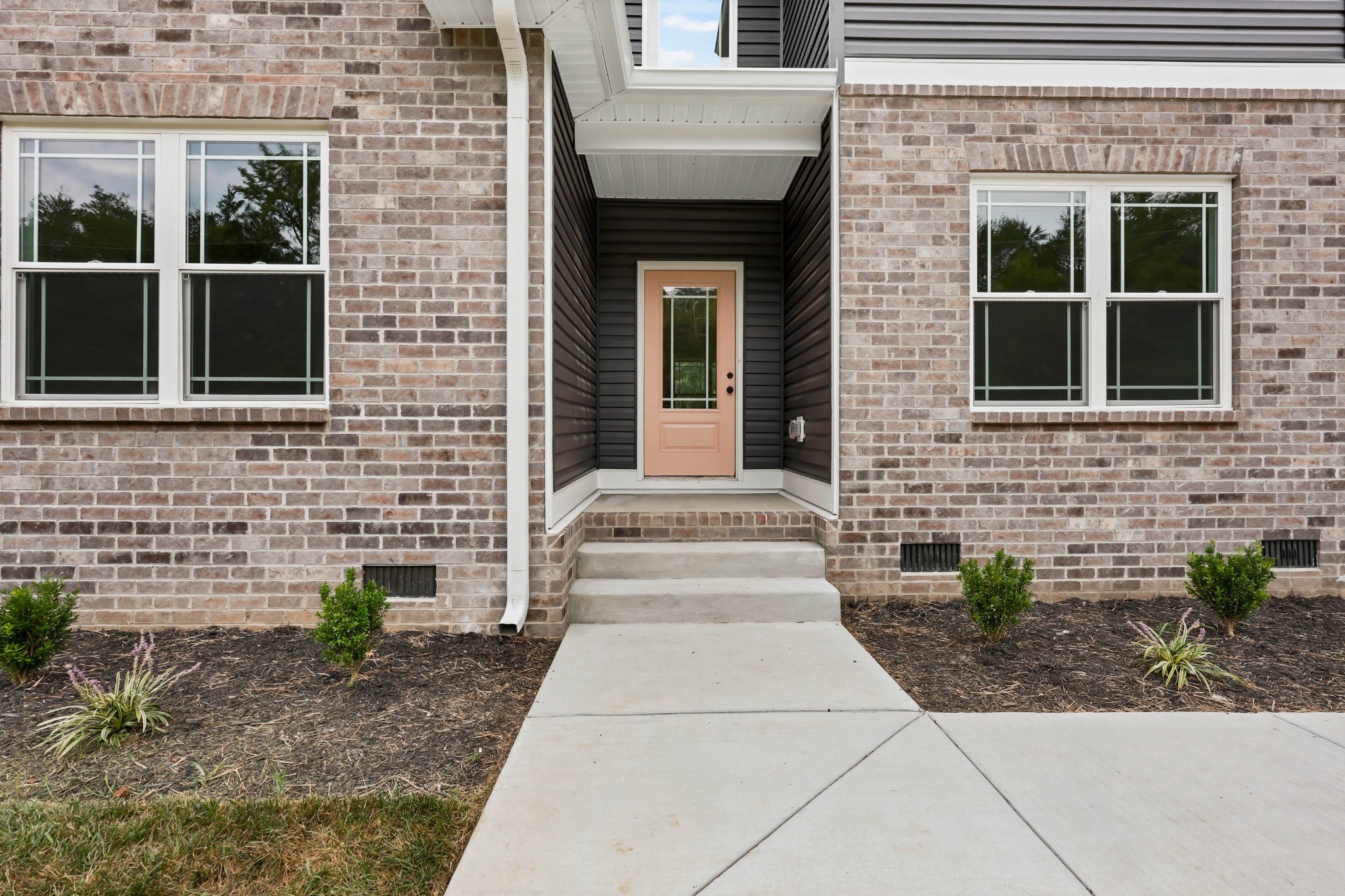 5580 Chambers Road Cumberland Furnace, TN 37051 - Photo 6 of 51 a front view of a house with potted plants