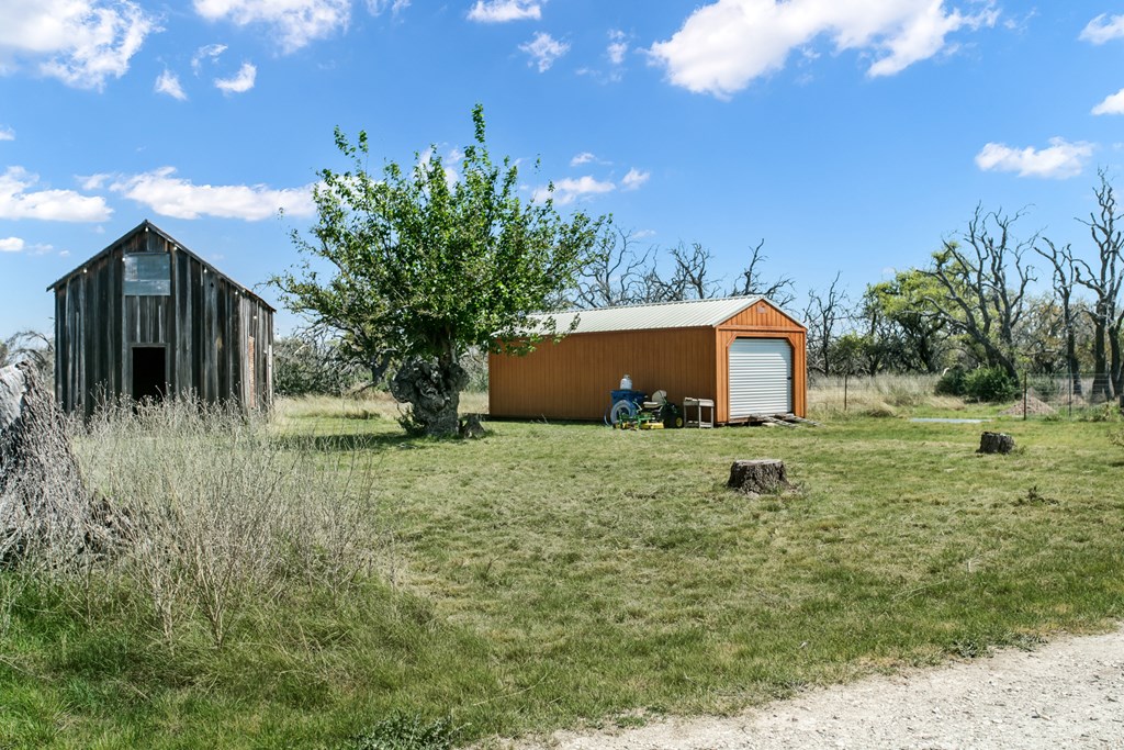 3527 Old Harper Road Fredericksburg, TX 78624 - Photo 23 of 43 a view of a house with a yard