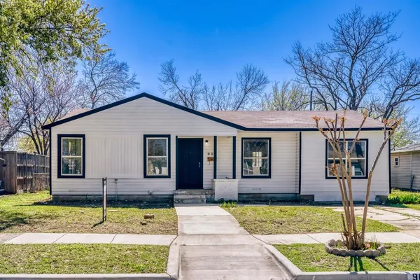 a house with trees in the background