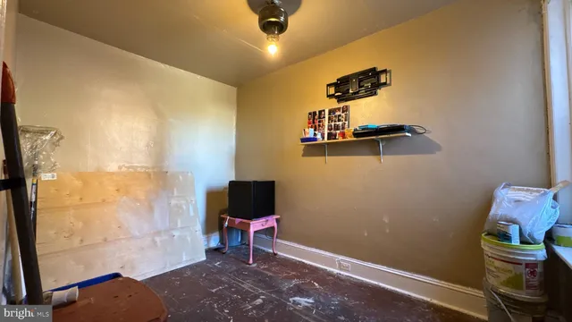 a bedroom with bed and a window