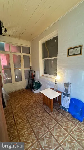 a living room with a couch and a table