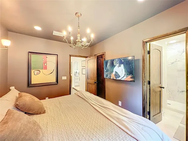 a bathroom with a double vanity sink mirror double and shower