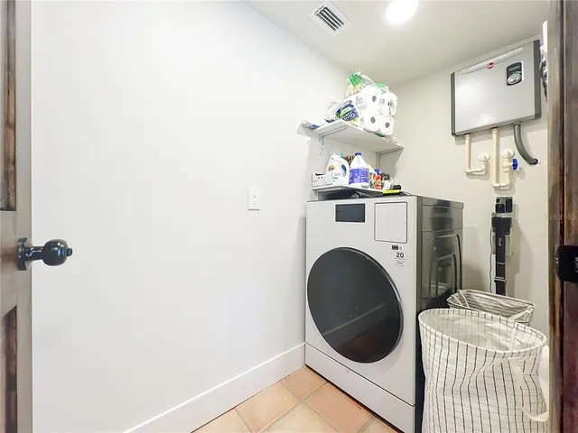 a storage room with washer and dryer
