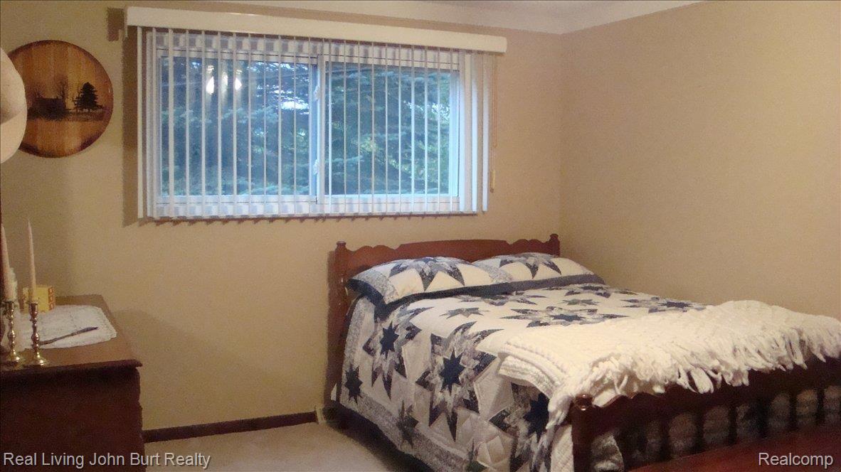 980 Rowland Road Leonard, MI 48367 - Photo 8 of 13 Second Bedroom